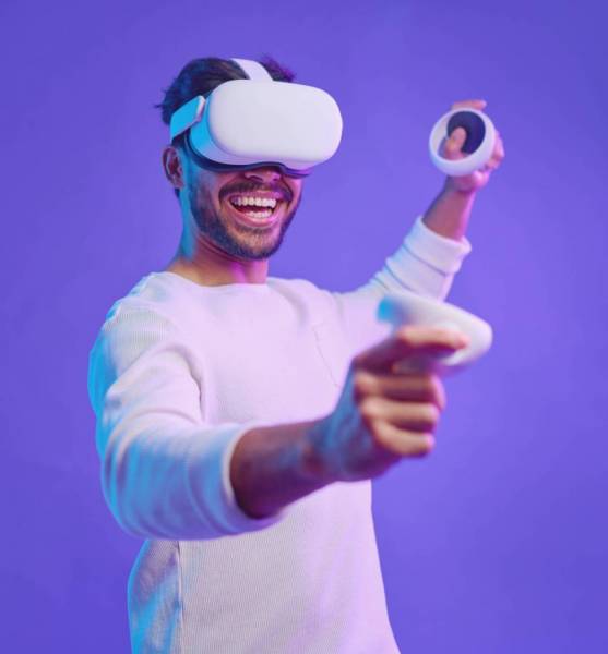 Metaverse, virtual reality glasses and a man with vr control futuristic gaming, cyber and 3d world. Gamer person with controller in hand for ar, digital experience and cyberpunk purple background app.